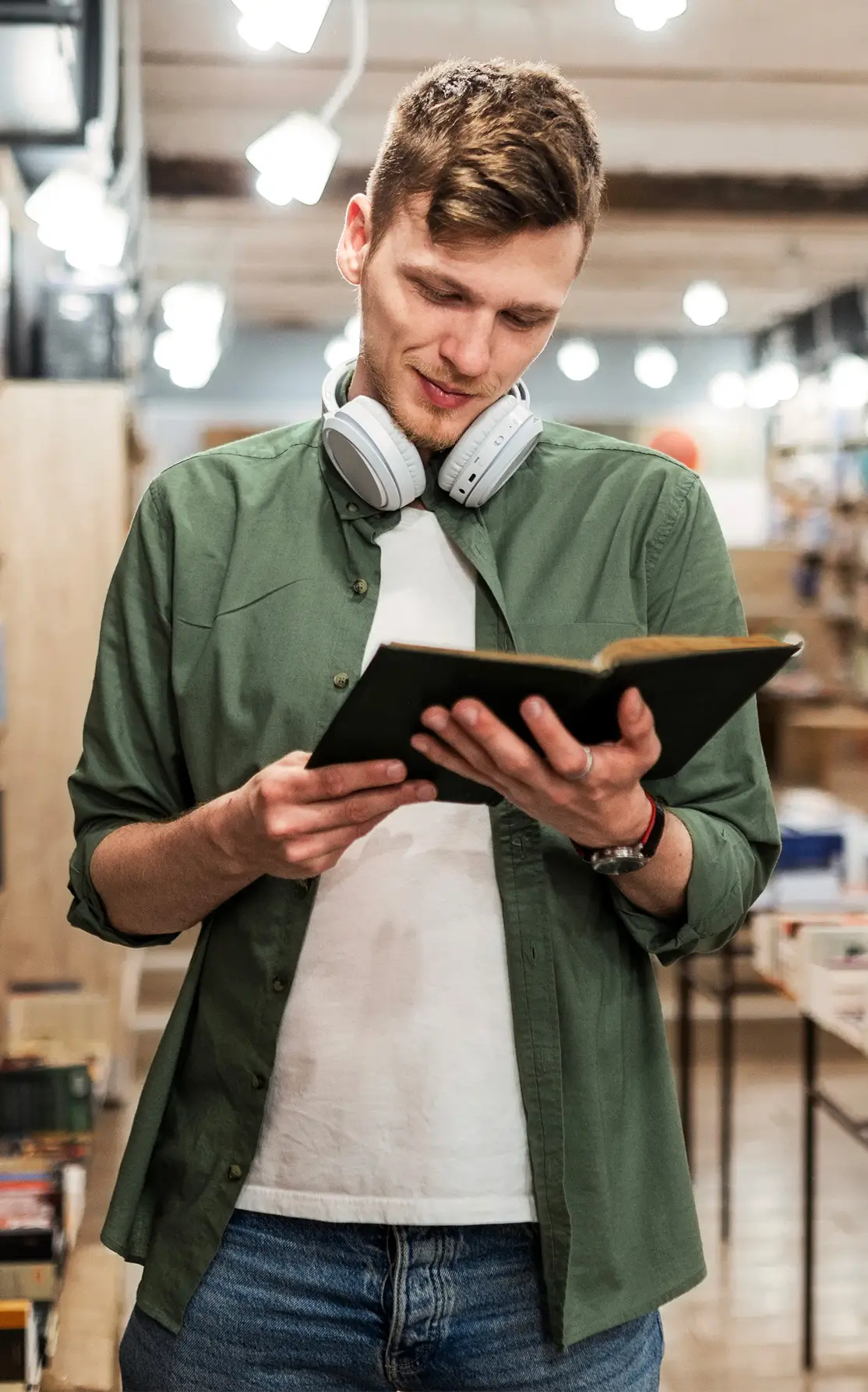 young man reading a book