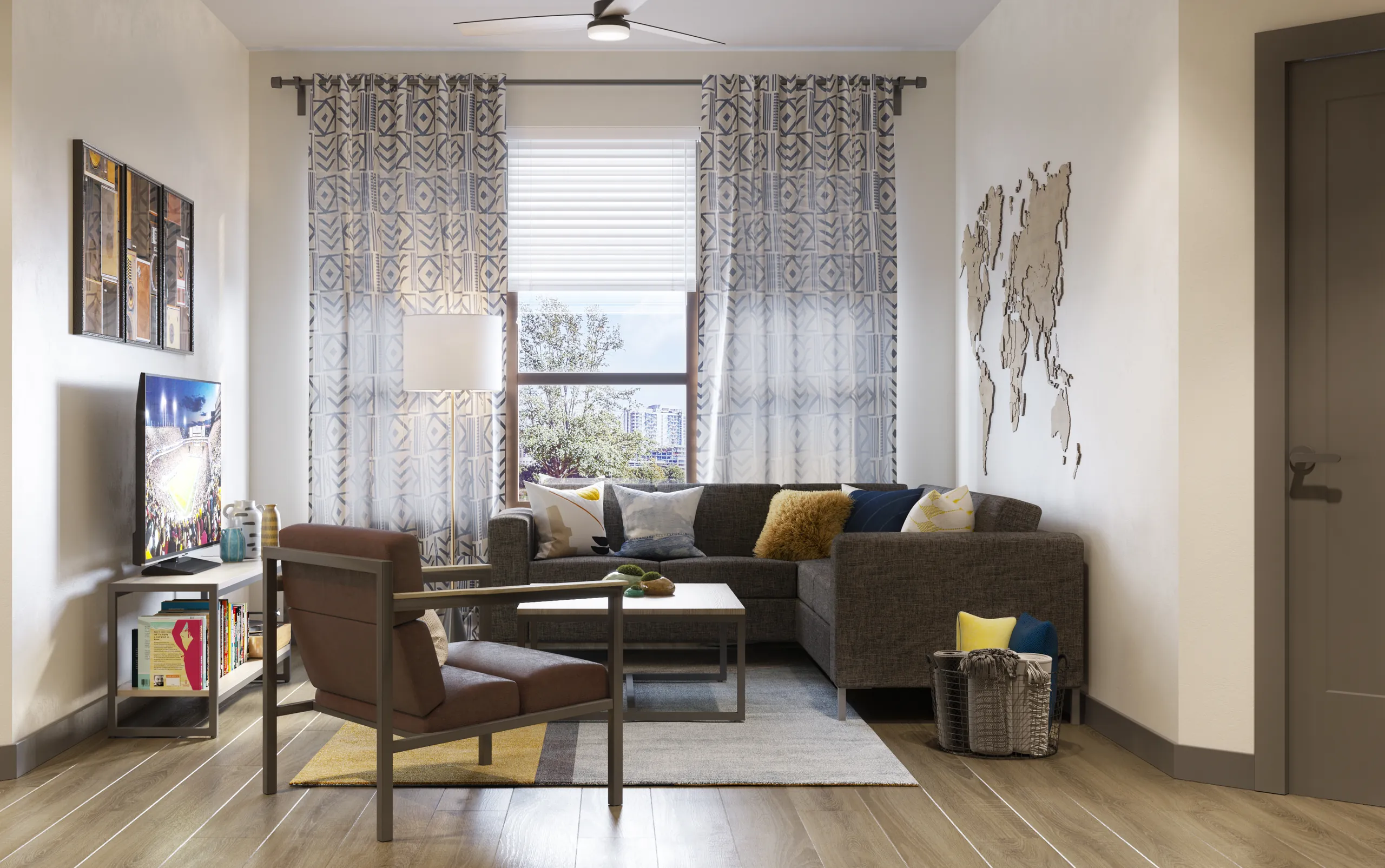 A furnished living room with a sectional sofa in a Canvas Tempe apartment