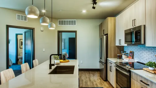 A kitchen in a Canvas Tempe apartment